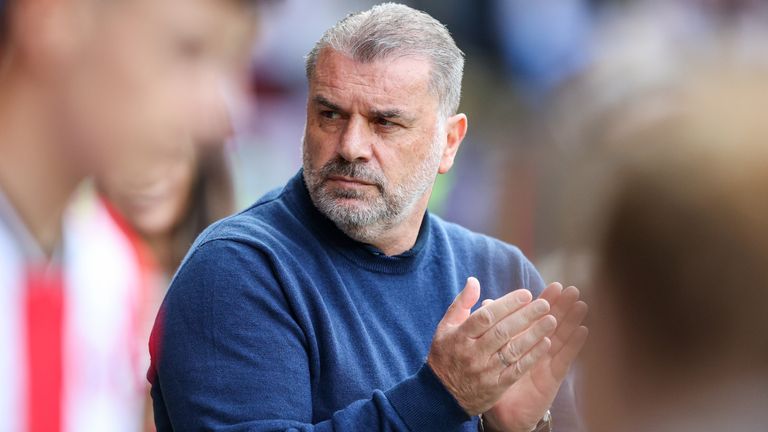 Ange Postecoglou applauds his players during Spurs' win at Sheffield United